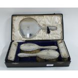 George V silver dressing table set with hand mirror, two hair brushes, two clothes brushes and comb,