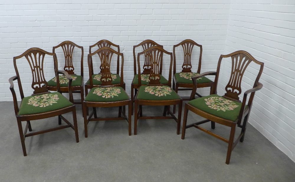 Set of eight Georgian style mahogany dining chairs with arched top rail and pierced splat backs,
