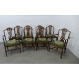 Set of eight Georgian style mahogany dining chairs with arched top rail and pierced splat backs,