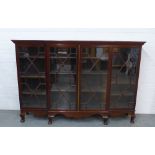 Late 19th / early 20th century mahogany breakfront bookcase with four astragal glazed doors, shelved