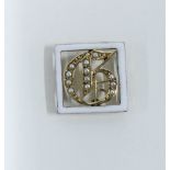 Small 19th century gold, enamel and seed pearl buckle formed as a gothic G, 1.5cm