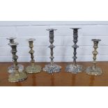 Georgian silver candlesticks to include a pair of Irish candlesticks and a set of four London silver