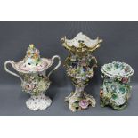 Coalbrookdale type floral encrusted porcelain vases, one with a cover (3) (a/f)