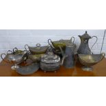 A quantity of fire damaged Georgian silver items to include coffee pots, sauce boats, etc (all