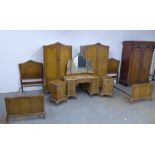 Early 20th century Queen Anne style walnut bedroom suite comprising a pair of two door wardrobes,