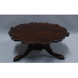 Georgian style mahogany lazy Susan, piecrust tray top on tripod base with paw feet,