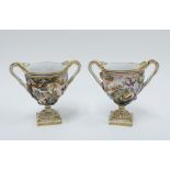 A pair of Capodimonte Bacchus urn vases (2) 14cm.