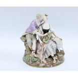 19th century porcelain figure group of a shepherdess and companion, blue crossed swords mark, (