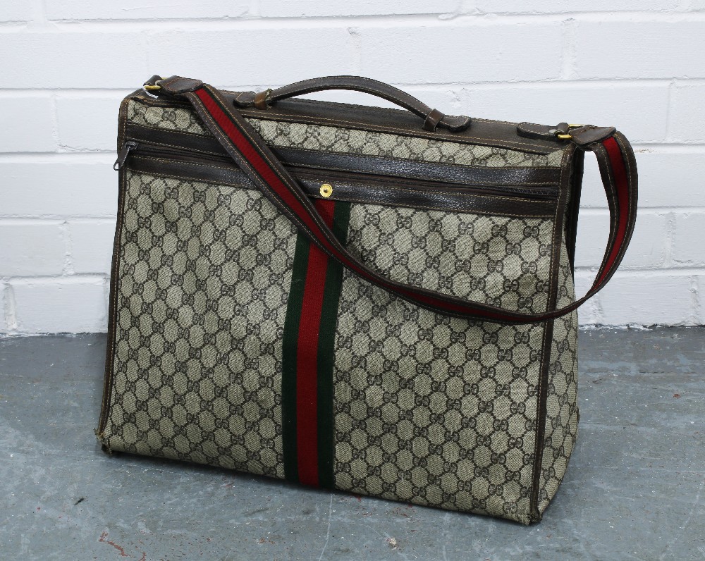 Vintage Gucci soft body canvas and leather weekend travel bag, with GG monogram and green and red