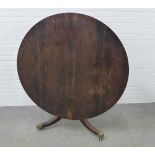 19th century rosewood breakfast table, circular tilt top on ring turned column and hipped outswept