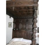 Oak tester bed, triple inlaid panelled back and carved lozenge panelled canopy. 250 x 154 x 220cm