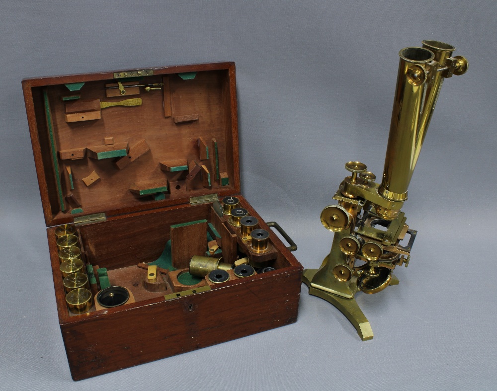 19th century lacquered brass microscope with a Wenham's Binocular by Ross, London, together with