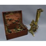 19th century lacquered brass microscope with a Wenham's Binocular by Ross, London, together with