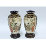 Pair of Japanese satsuma vases, gilded and painted with a female in a garden, signature mark to base