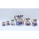 Six Masons & Ironstones Imari jugs with green serpent handles, graduating size, (6) tallest 22cm,