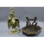 Iron boot scraper and a brass eagle doorstop (2)