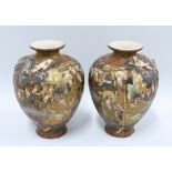 Pair of Japanese Thousand Faces earthenware vases (2) 22cm.
