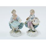 A pair of Sitzendorf porcelain figures, (2) 12cm.