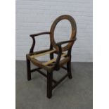 George III mahogany armchair frame with curved oval back and serpentine seat with open scroll
