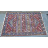 Indian made Kilim rug with blue and red field. 233 x 151cm.