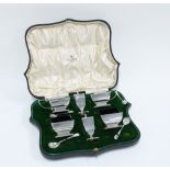 Mappin & Webb silver six piece condiment set, Birmingham 1911, complete with blue glass liners and