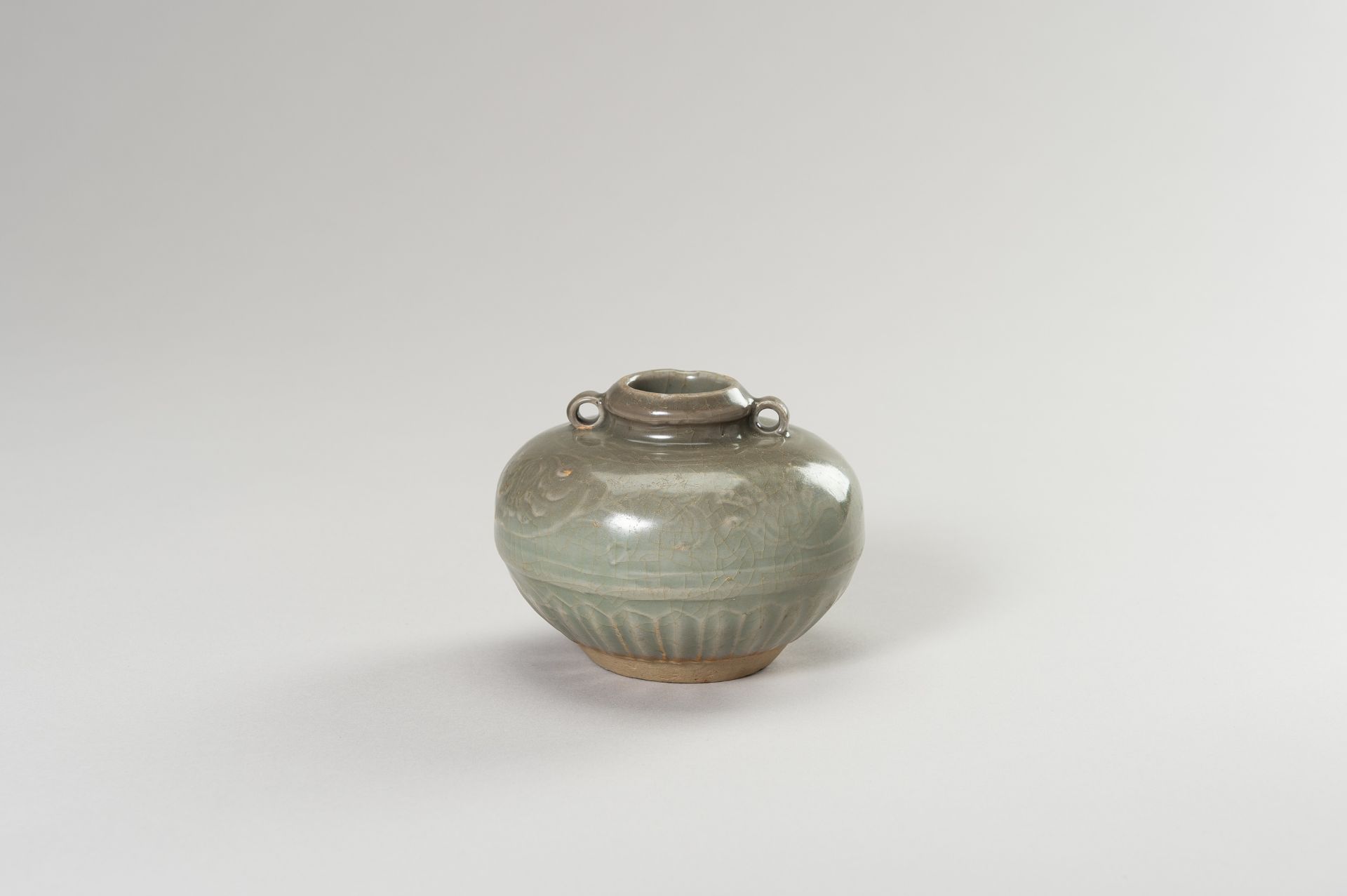 A LONGQUAN CELADON GLAZED JARLET