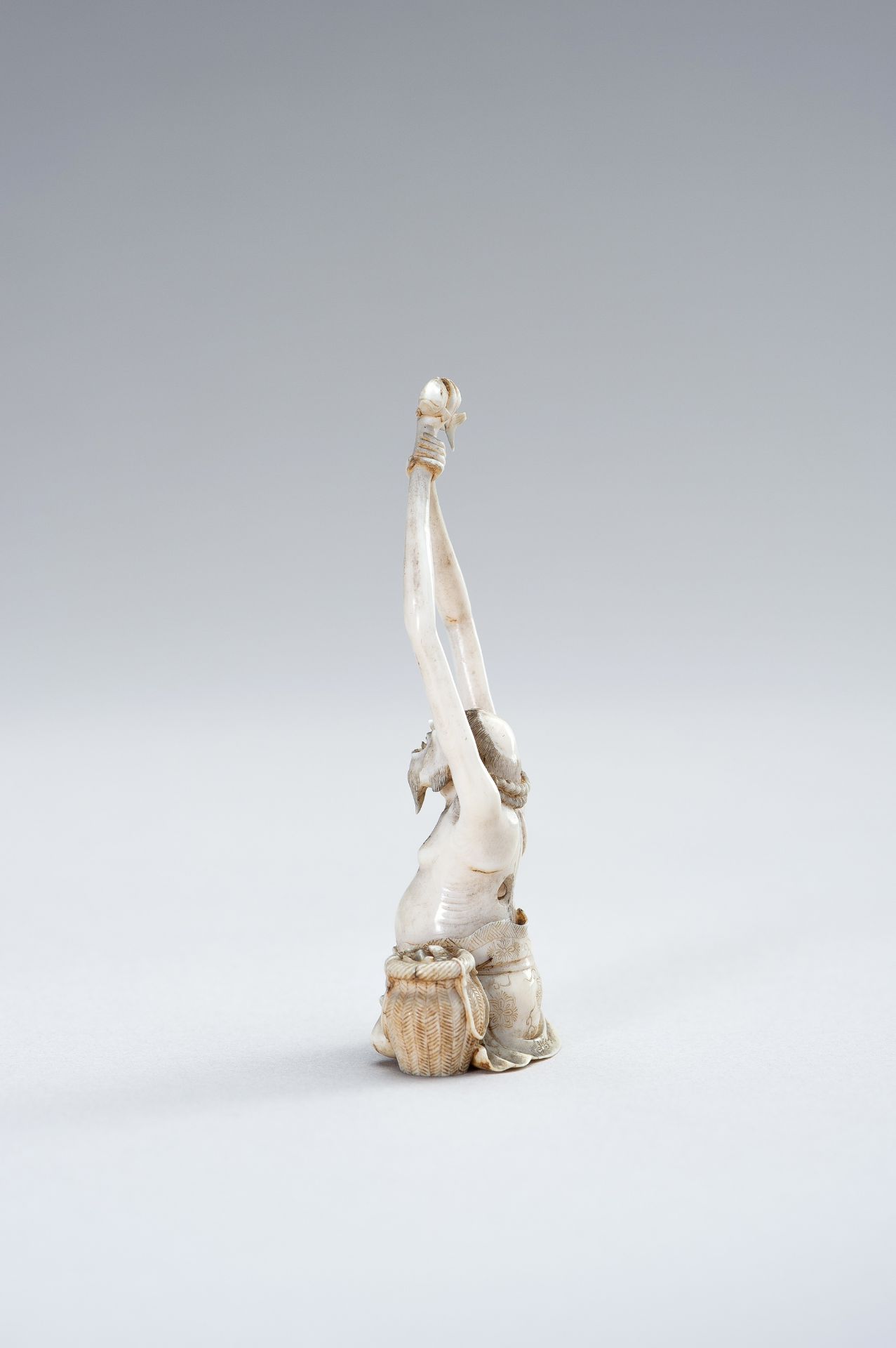 AN IVORY OKIMONO OF TENAGA - Image 12 of 13