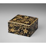 A LACQUER BOX AND COVER WITH MONS