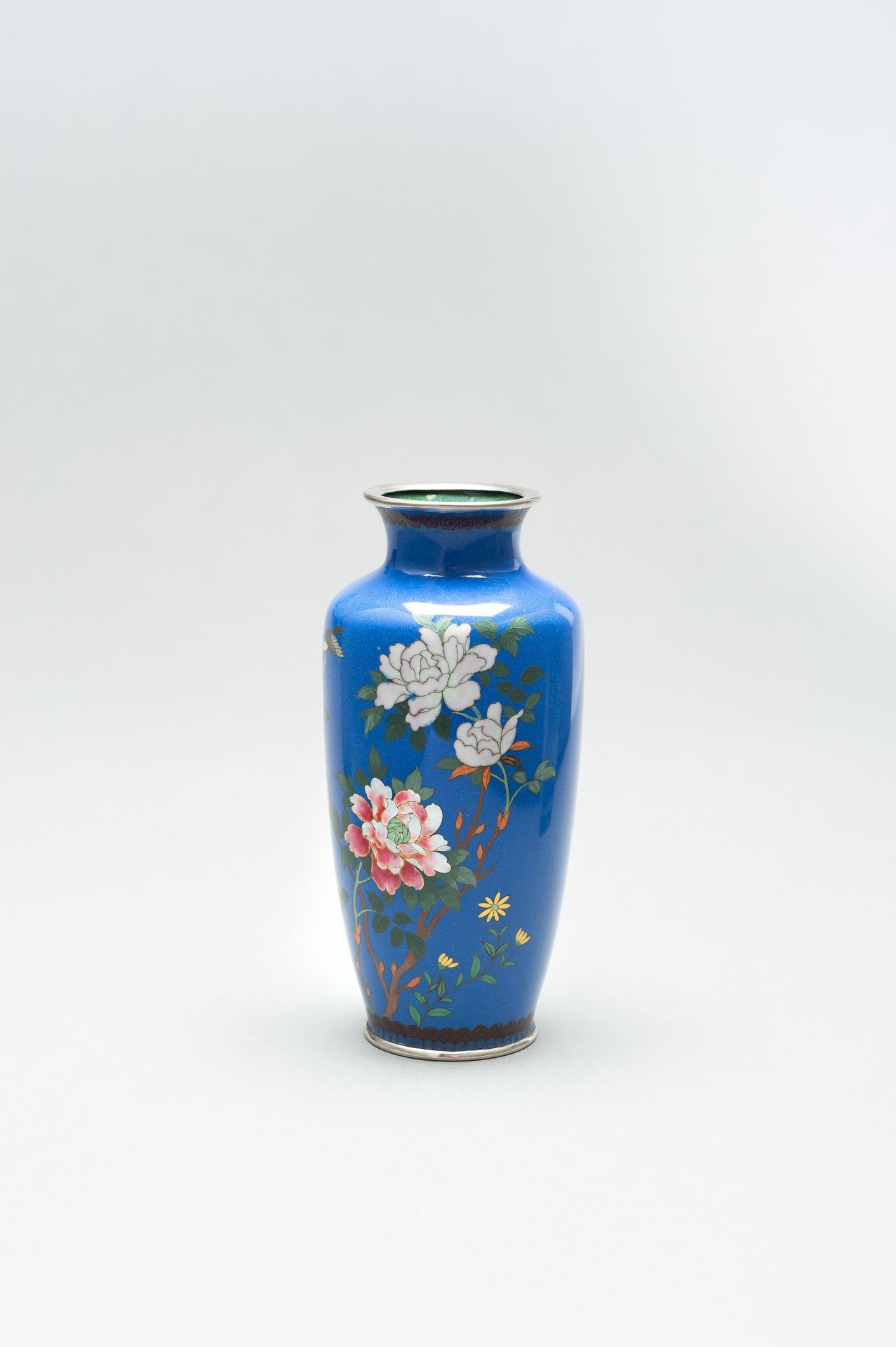 A BLUE CLOISONNE ENAMEL VASE WITH PEONIES