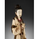 A TALL PAINTED IVORY FIGURE OF LIN DAIYU, LATE QING TO REPUBLIC