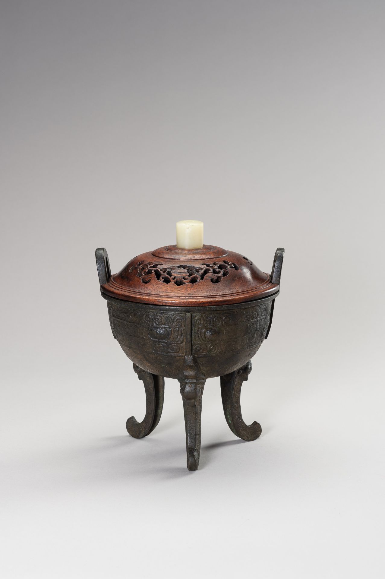 AN ARCHAISTIC DING-FORM BRONZE TRIPOD CENSER