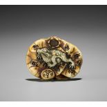 A METAL-INLAID WALRUS IVORY NETSUKE WITH FROG AND LOTUS