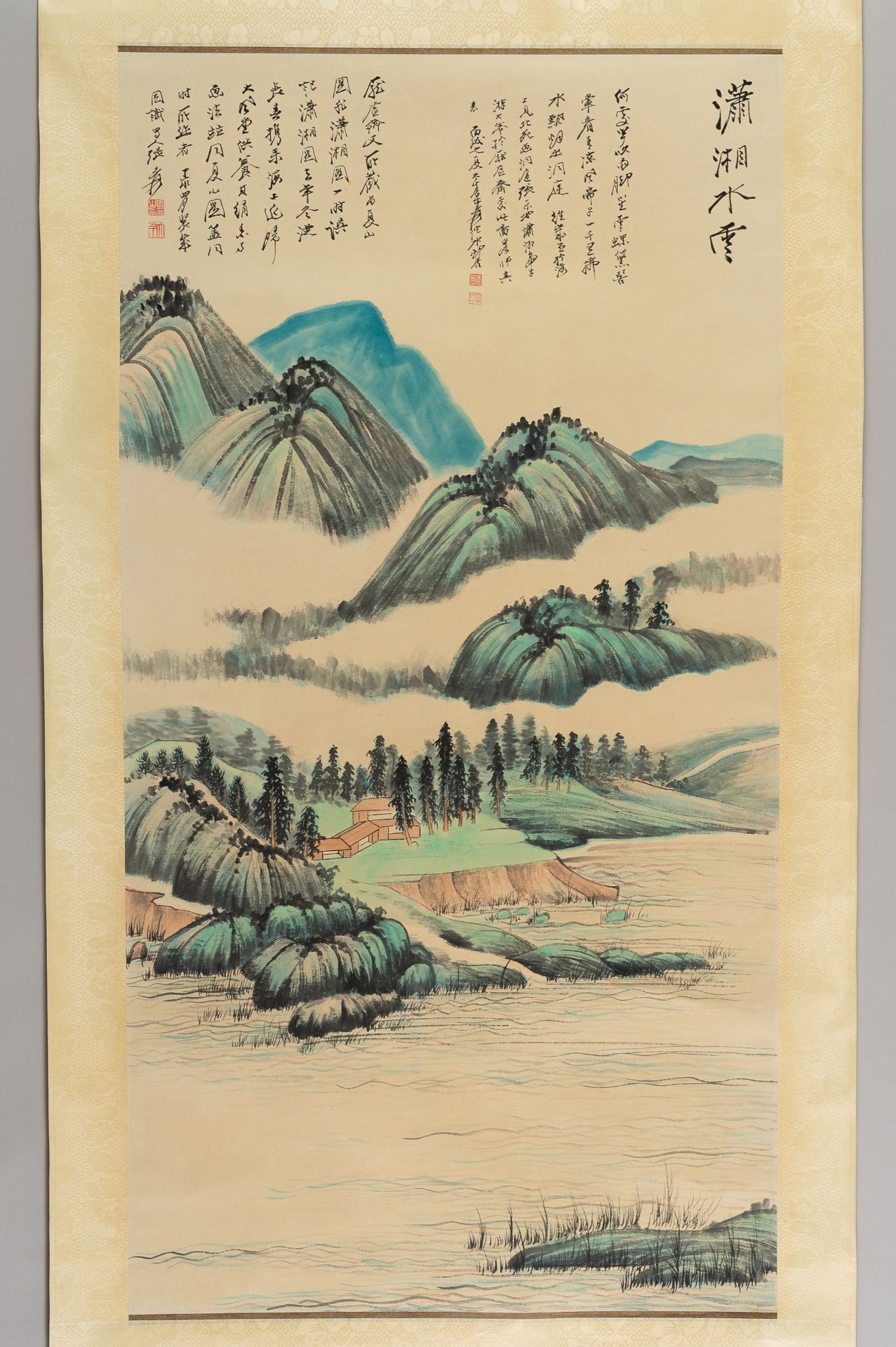 A SCROLL PAINTING OF A LANDSCAPE, AFTER ZHANG DAQIAN
