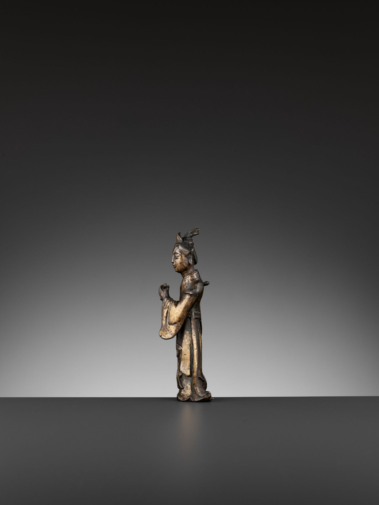 A PARCEL-GILT BRONZE FIGURE OF A FLUTIST, SONG TO MING DYNASTY - Image 7 of 11