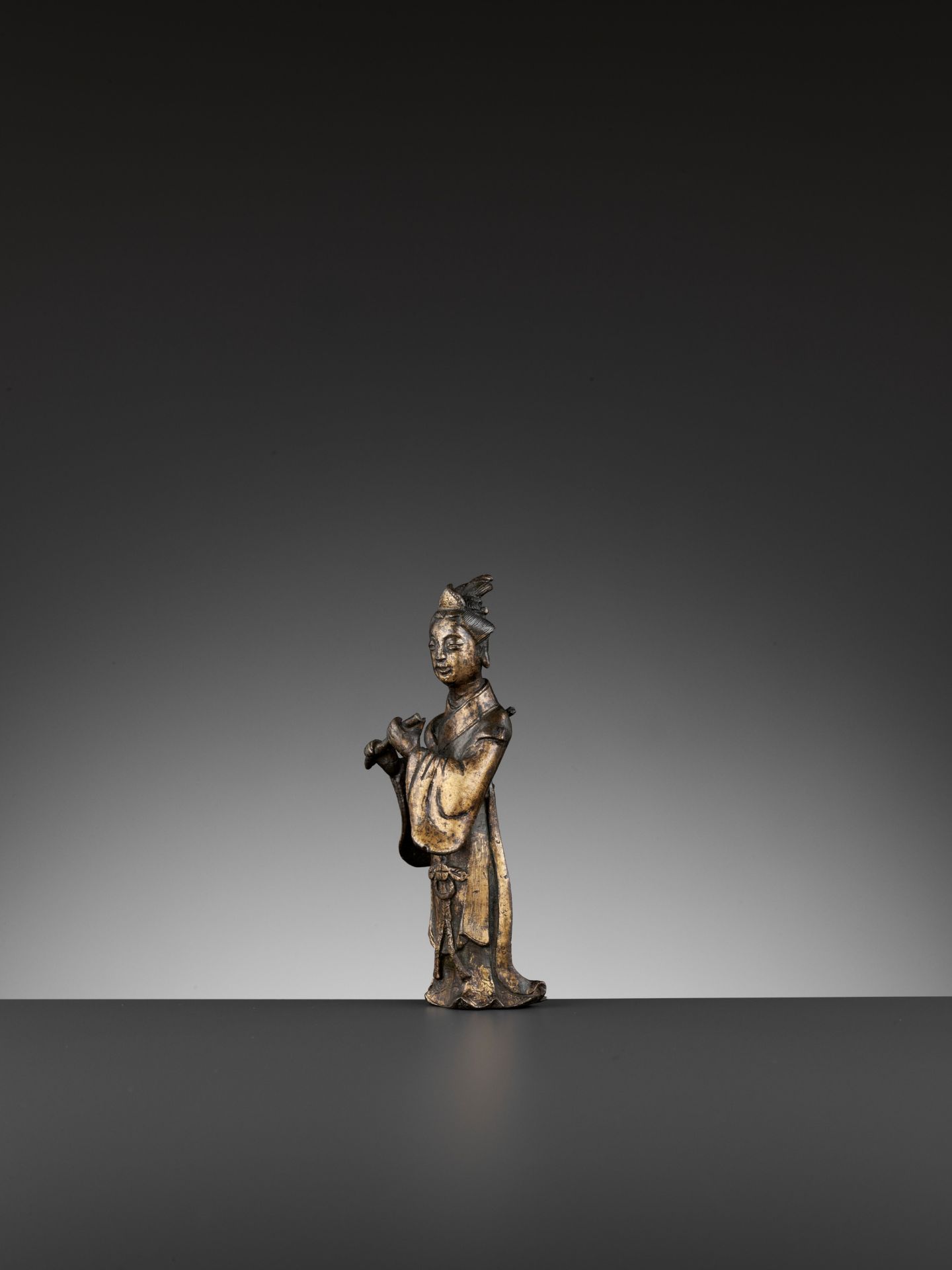 A PARCEL-GILT BRONZE FIGURE OF A FLUTIST, SONG TO MING DYNASTY - Image 5 of 11