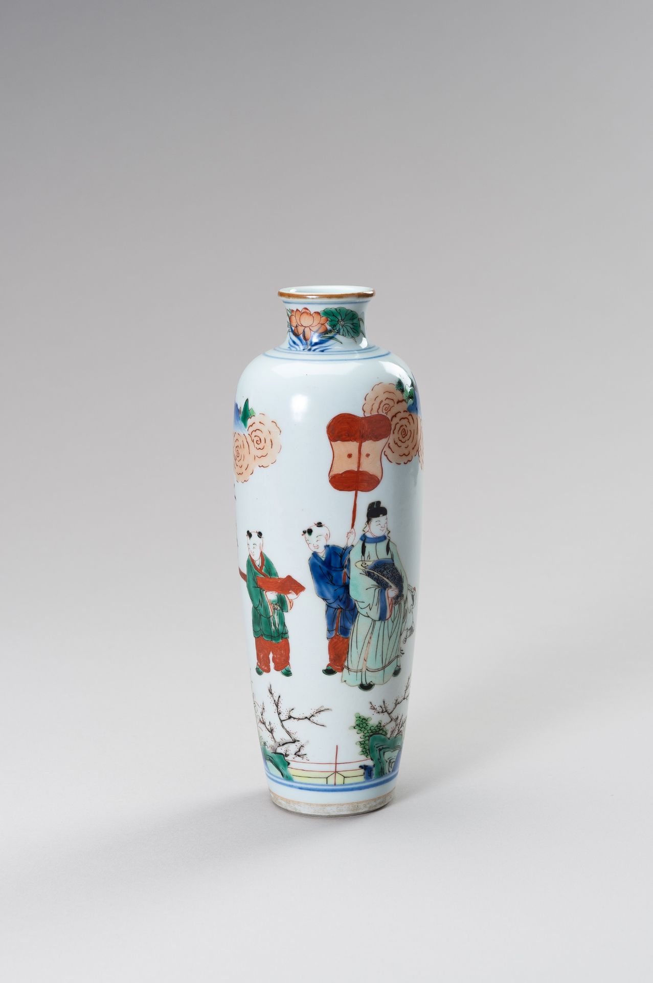 A PORCELAIN 'WUCAI' VASE WITH A COURT FIGURE AND SERVANTS IN A PALACE GARDEN