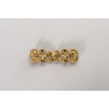 AN APPEALING GILT BRONZE BELT HOOK