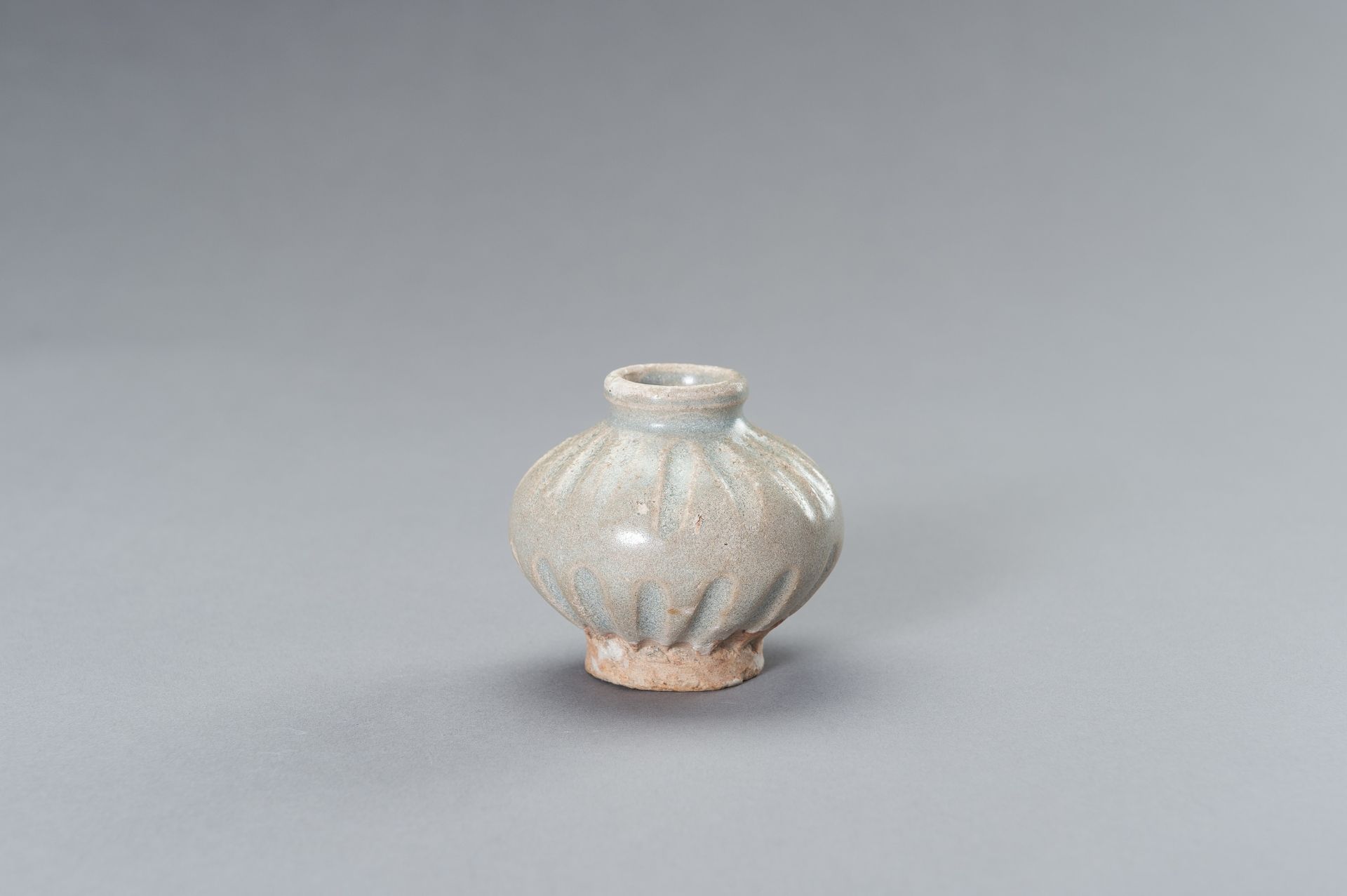 A SMALL PAIR OF CELADON- GLAZED CERAMIC JARLETS