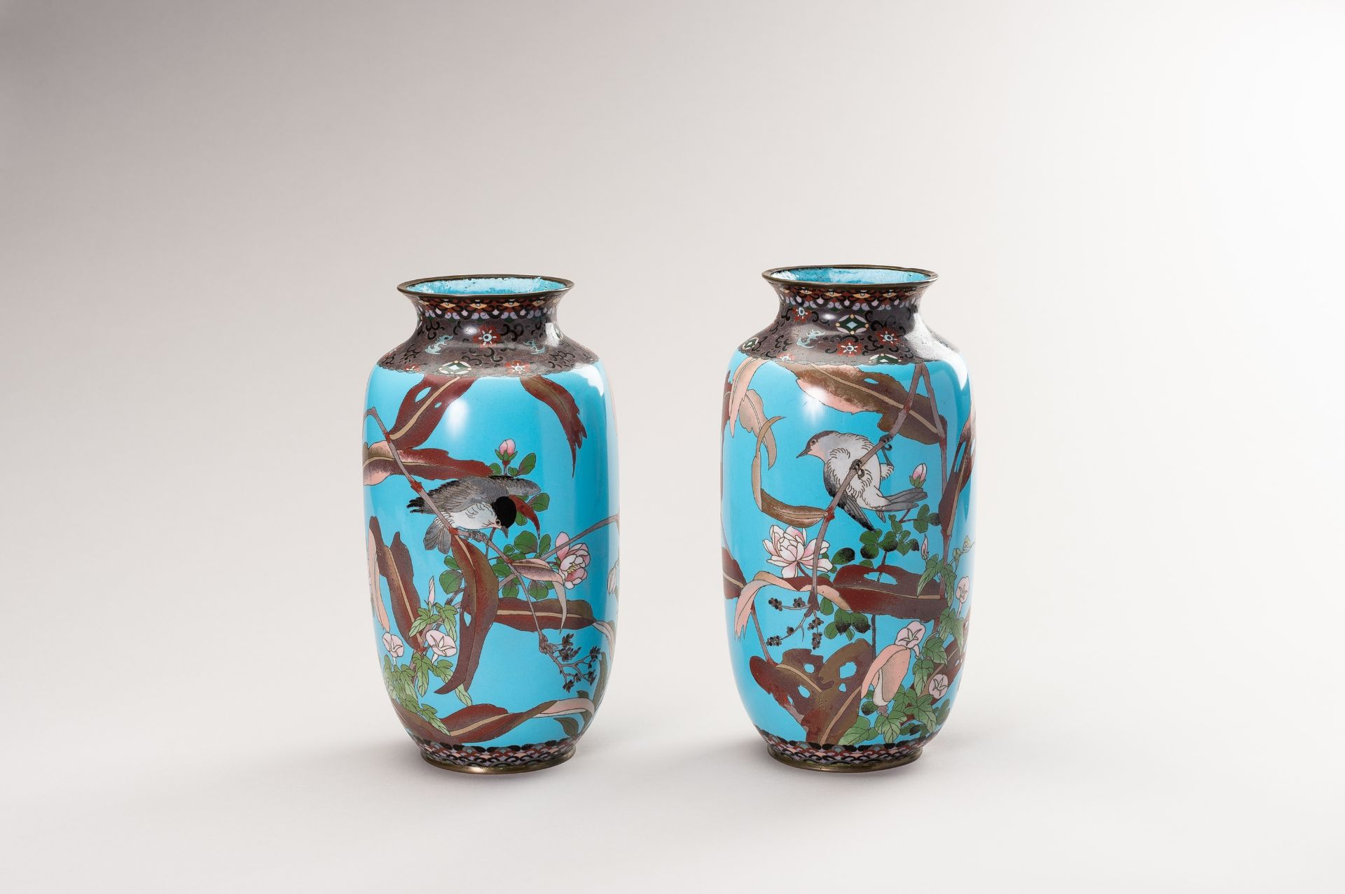 A PAIR OF TWO CLOISONNE VASES WITH BIRDS AND FLOWERS