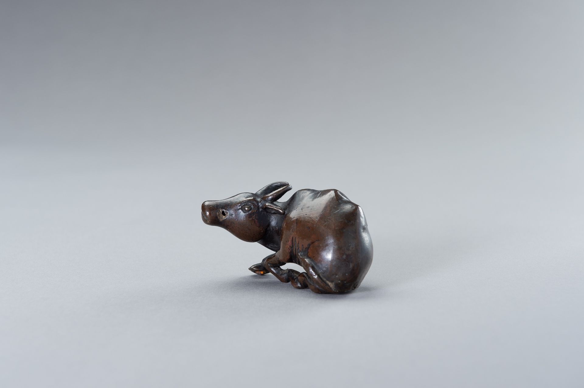 A CHINESE BRONZE FIGURE OF A WATER BUFFALO - Image 5 of 10