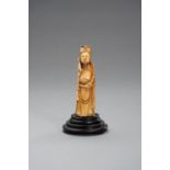 AN IVORY CARVING OF AN IMMORTAL, MING