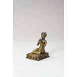 A SMALL BRONZE FIGURE OF A PRAYING WORSHIPPER