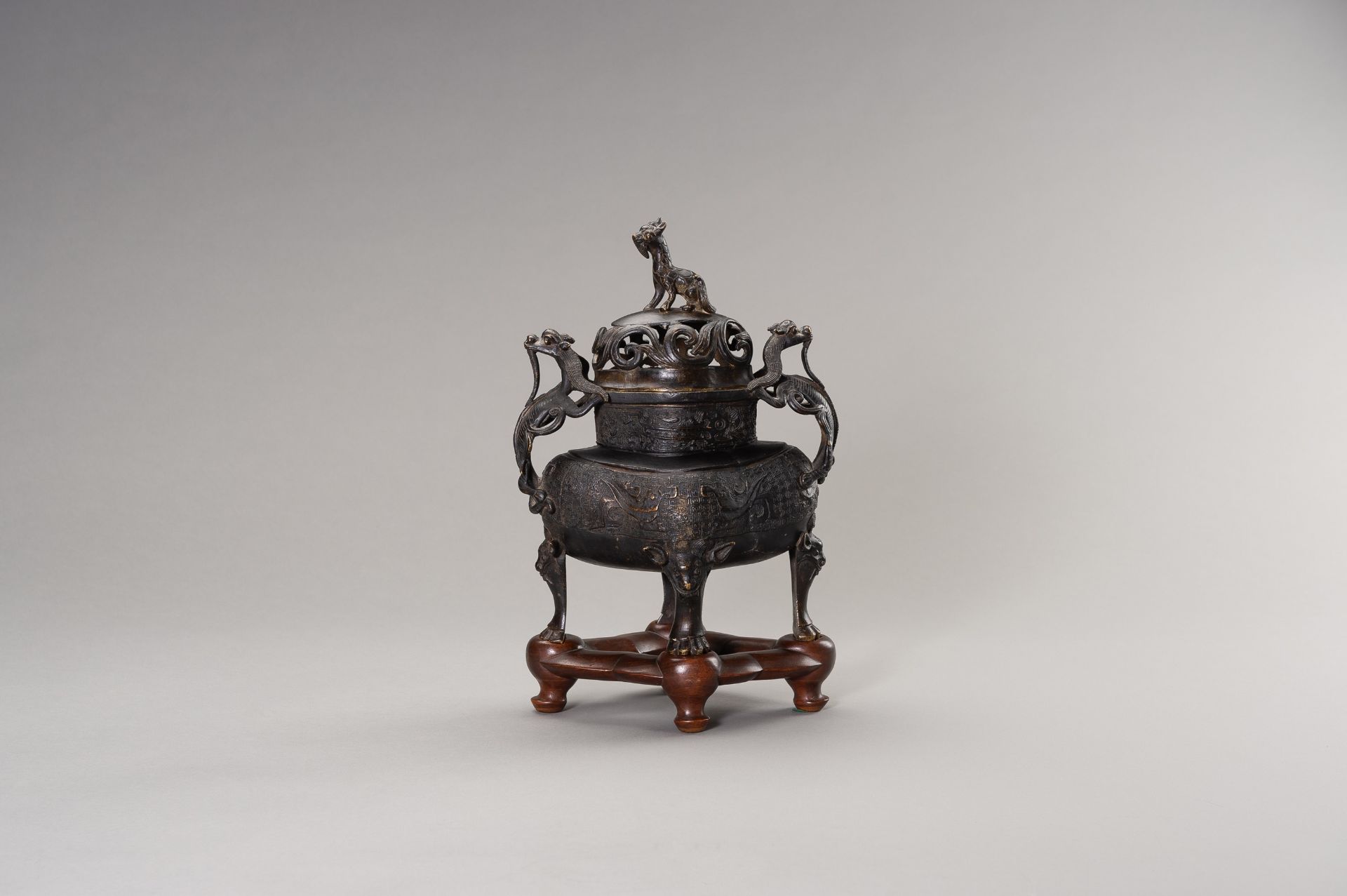 AN ARCHAISTIC BRONZE CENSER WITH QILINS