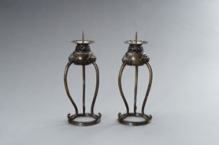 A PAIR OF BRONZE CANDLE STICK HOLDERS