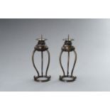 A PAIR OF BRONZE CANDLE STICK HOLDERS