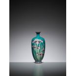 A TURQUOISE CLOISONNE ENAMEL VASE WITH IRIS