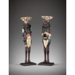 A PAIR OF PAINTED AND LACQUERED WOOD FIGURAL CANDLESTICKS DEPICTING ONI