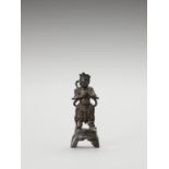 A BRONZE FIGURE OF A GUARDIAN KING, MING