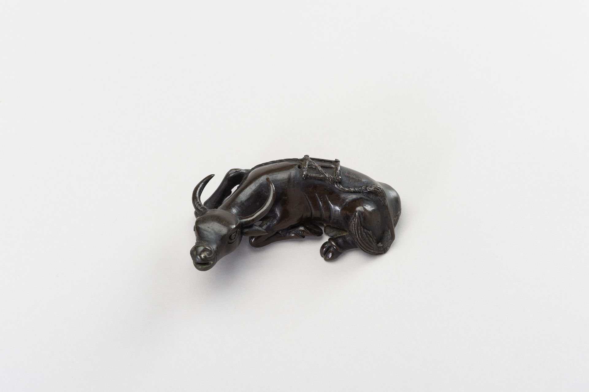 A CHINESE BRONZE FIGURE OF A TAMED WATER BUFFALO - Image 2 of 11