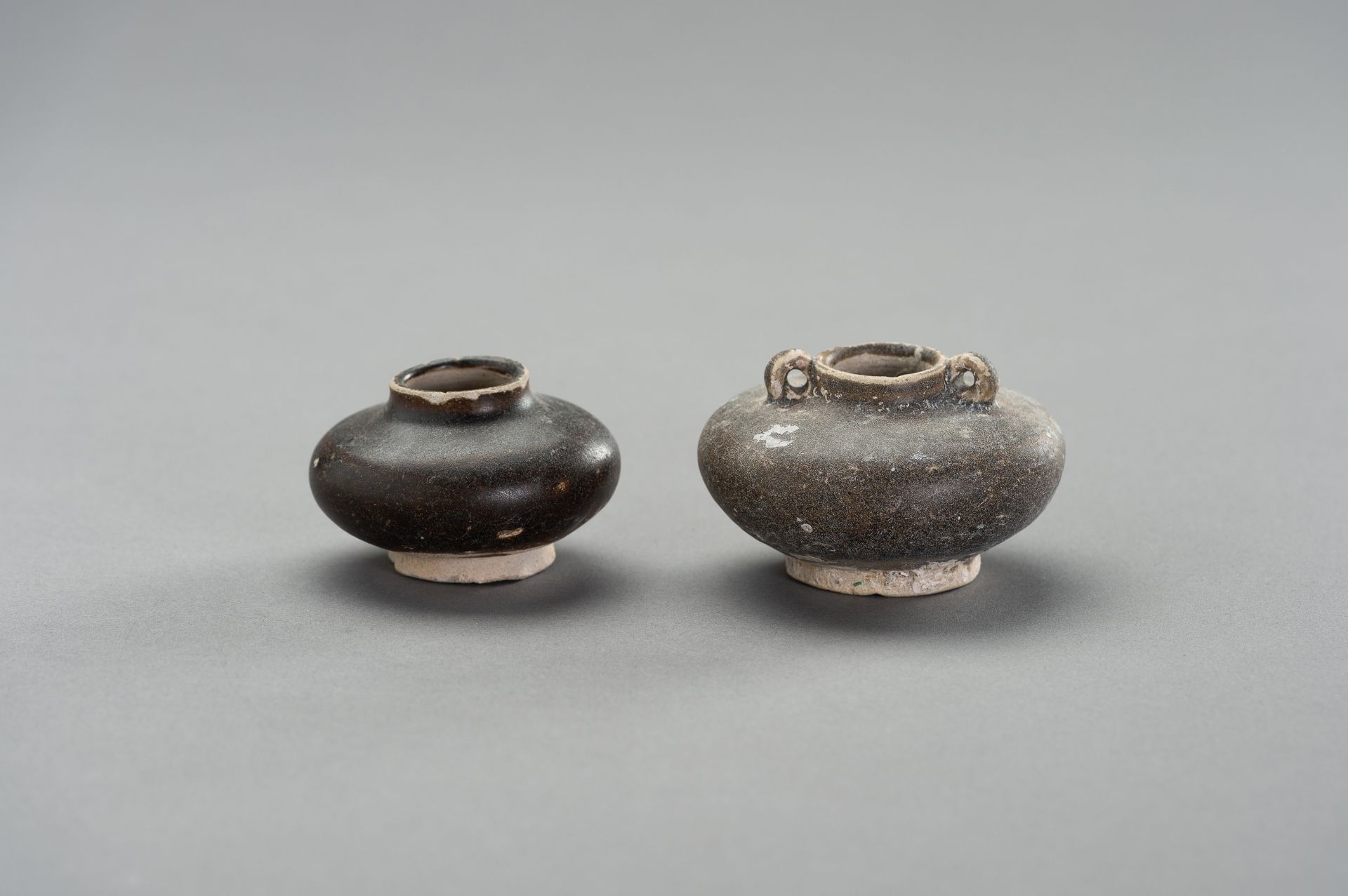 TWO GLAZED CERAMIC 'SHIPWRECK' POTS